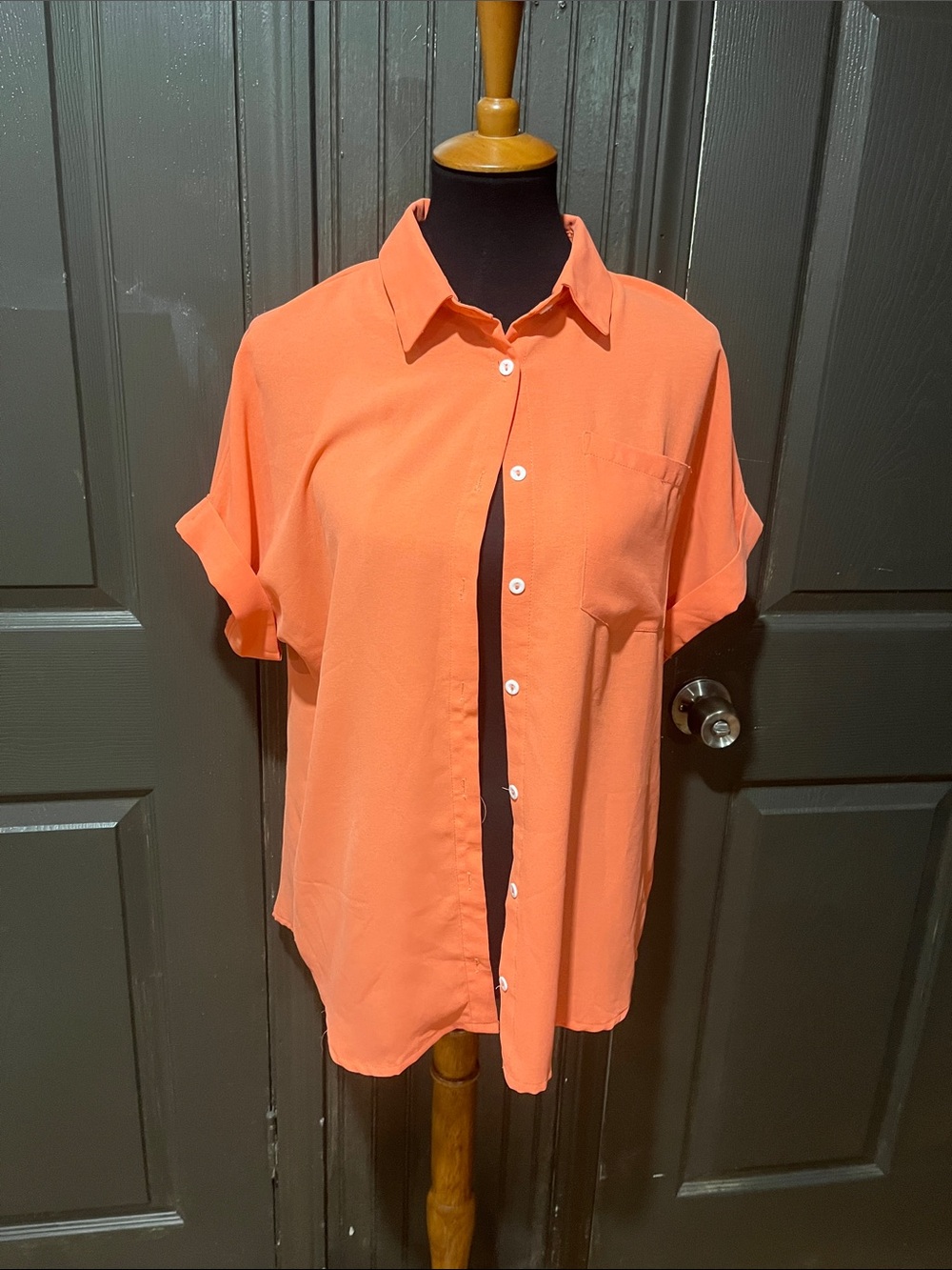 Melon colored ladies medium button-down shirt